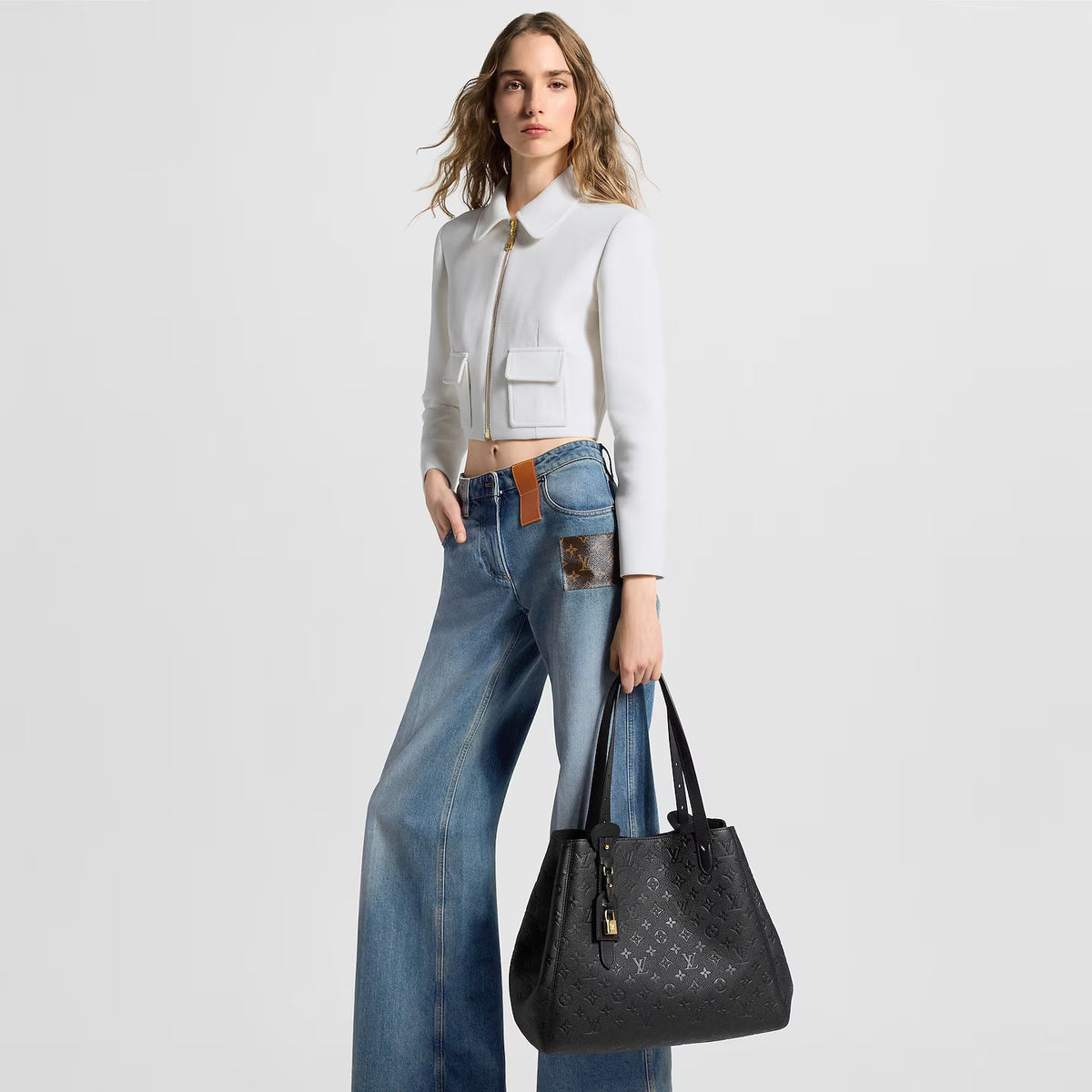 Latest Baby Collection: Luxury Handbag with Refined Versatility